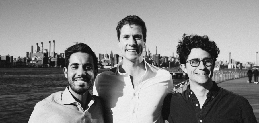 Altana founders, left to right: Raphael Tehranian, Evan Smith, Peter Swartz. They are all stood at the bank of a river, smiling. 