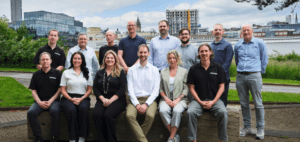 Sitehop team sat for a photograph outside their Sheffield headquarters.